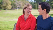 Couple sitting in a park